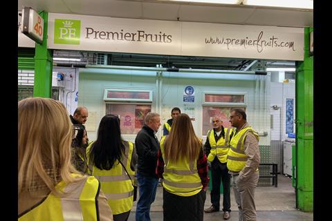 Jason Tanner shows the group round Premier Fruits